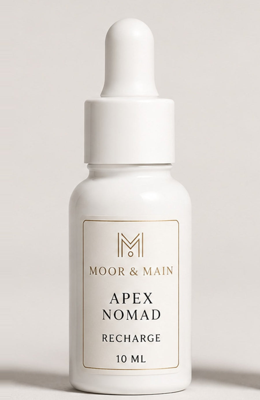 Recharge Apex Nomad 10 ml, flacon blanc et étiquette ivoire et or