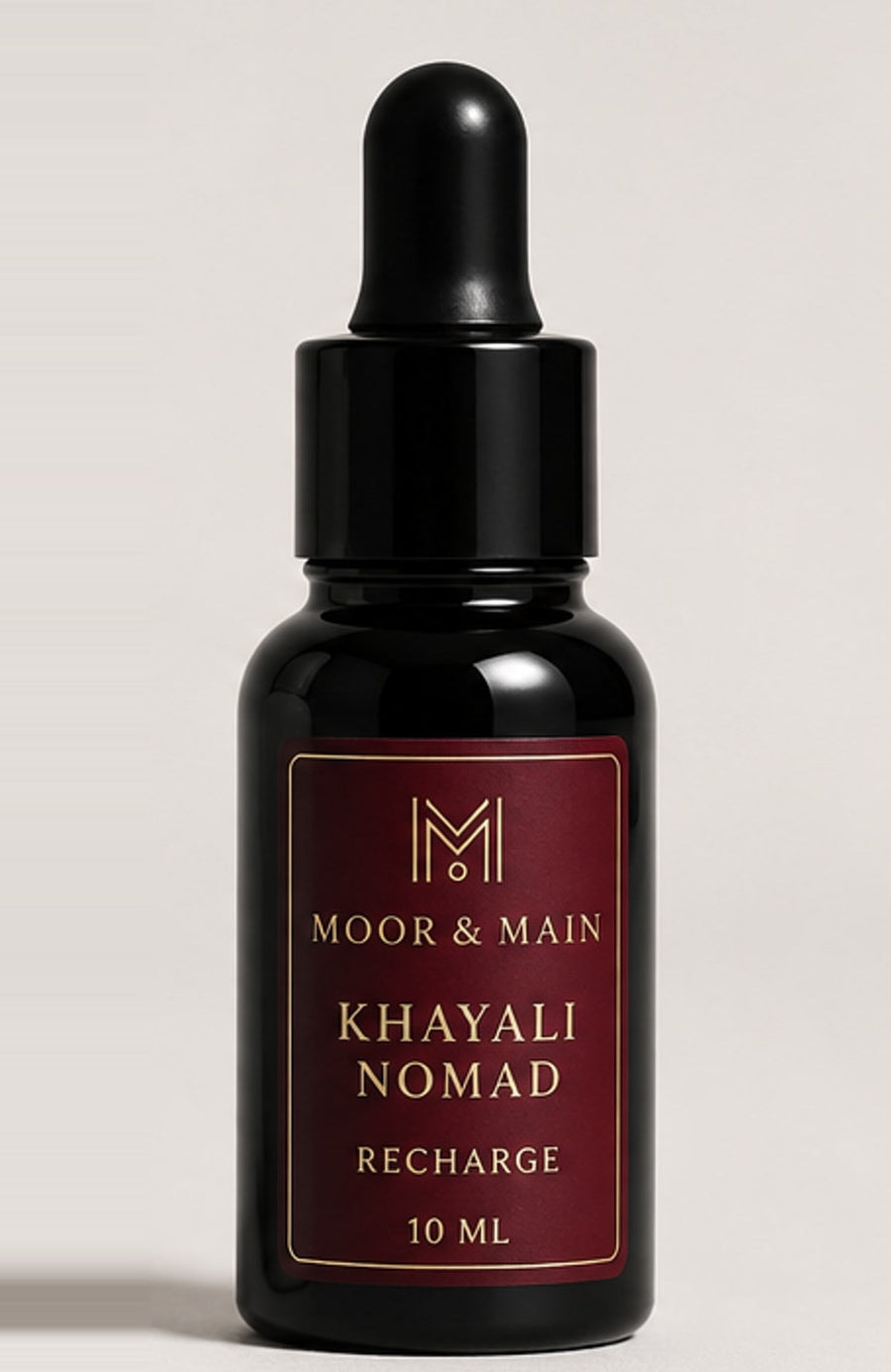 Recharge Khayali Nomad 10 ml, flacon noir et étiquette grenat et or