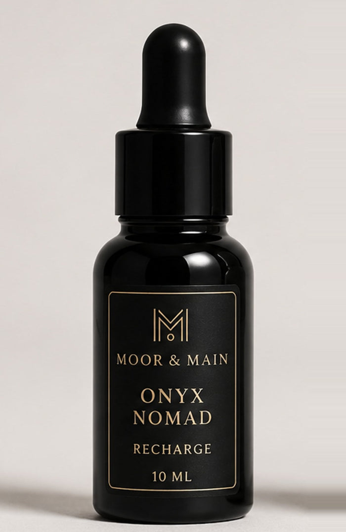 Recharge Onyx Nomad 10 ml, flacon noir et étiquette noire et or
